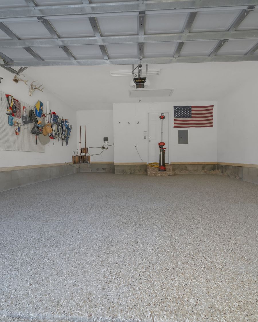 The same garage finished wall to wall in grey and white chip flake