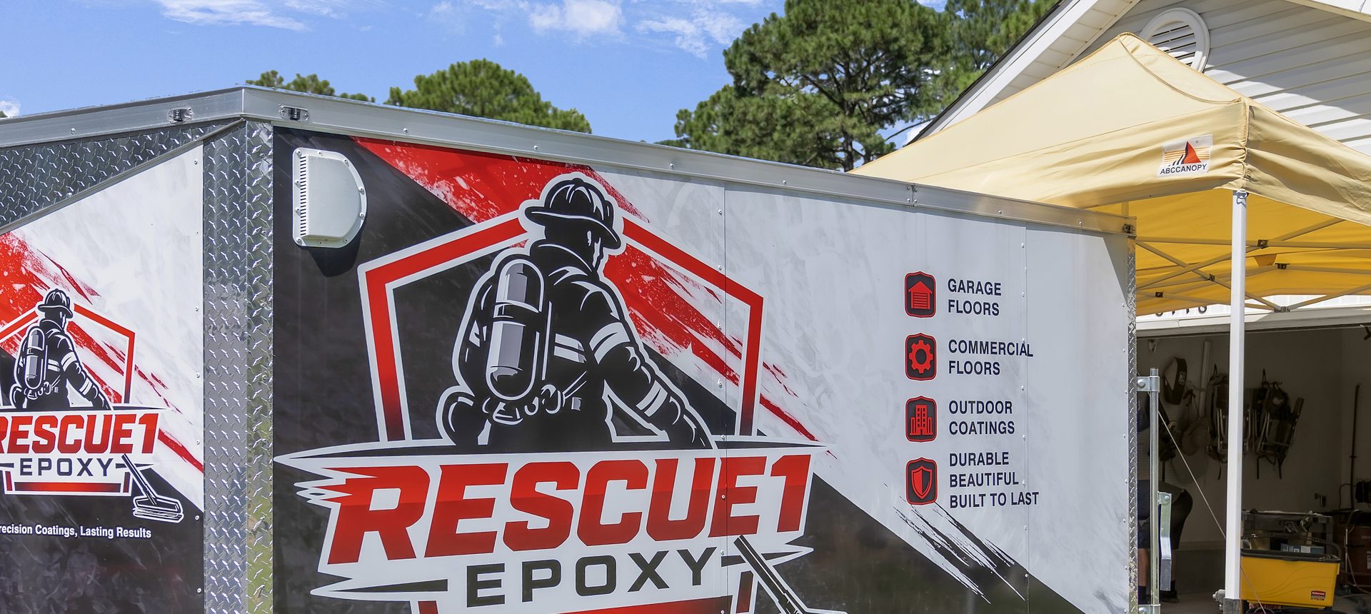 Rescue 1 Epoxy branded work trailer on a residential job in Northwest Florida